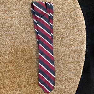 Red grey and white striped tie